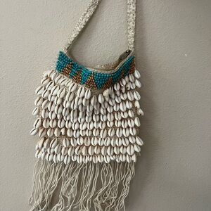 Cowry shell purse